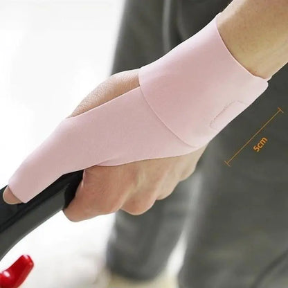 Person wearing beige thumb wrist brace during daily activity - thin profile fits under gloves - ActiveSupport UK